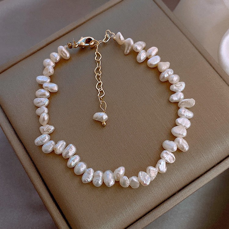 Natural freshwater pearl bracelet baroque shaped millet grains peach blossom bracelet female ins niche design bracelet