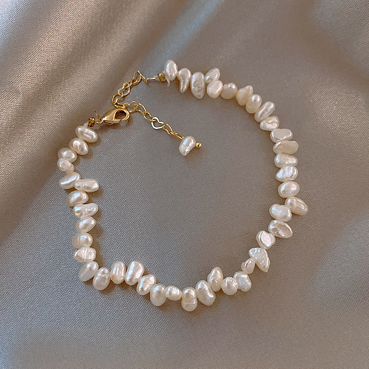 Natural freshwater pearl bracelet baroque shaped millet grains peach blossom bracelet female ins niche design bracelet