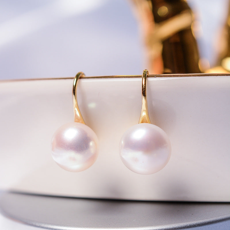 Strong light natural freshwater pearl earrings light luxury temperament 925 sterling silver gold-plated silver high-heeled shoes earhook earrings for women